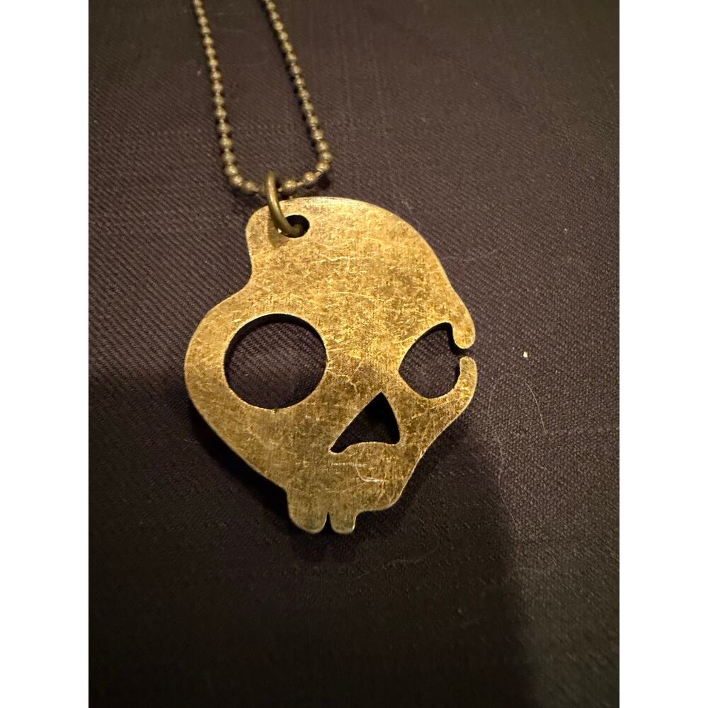 Official Skullcandy logo on a ball chain in bronze 32”necklace Vintage Rare